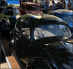 The VW38 next to the recent VW-built replica of the pre-beetle prototype, and the Berlin-Rome racer!